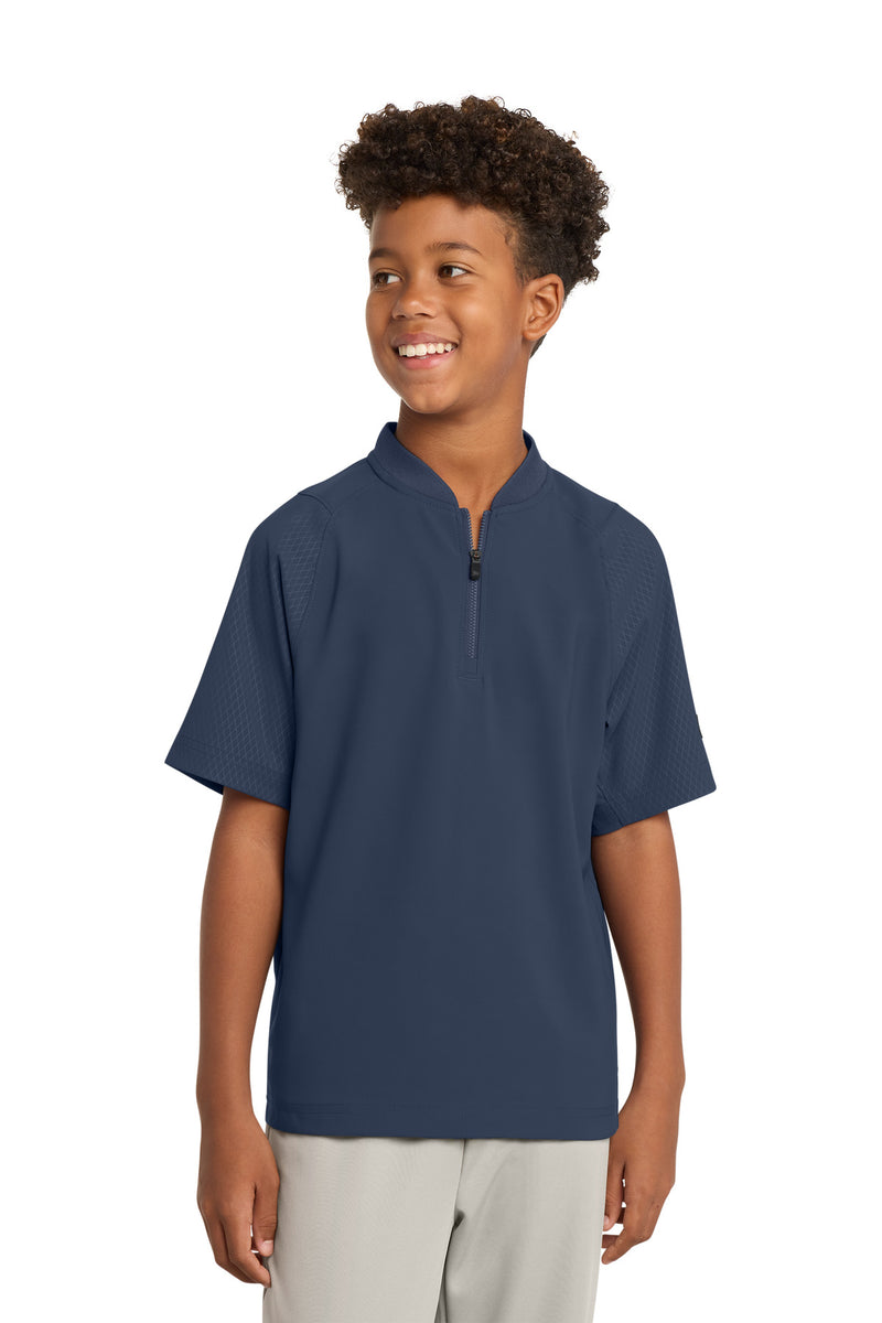 New Era  ®  Youth Cage Short Sleeve 1/4-Zip Jacket. YNEA600